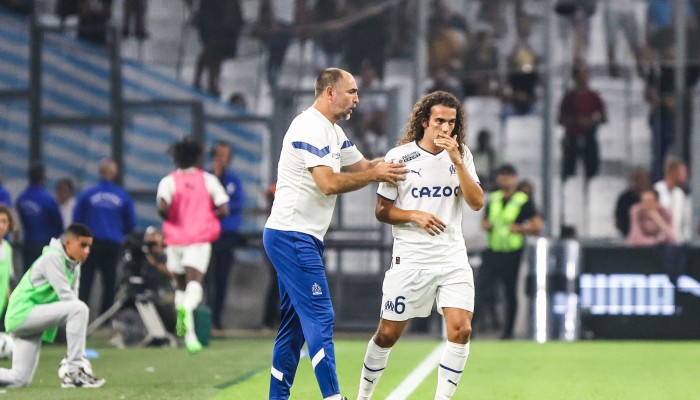 Tudor and Guendouzi assistance a taulier following his ordeal